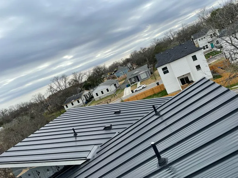 Standing seam metal roof panels with vents for Skylight Repair in Ripley